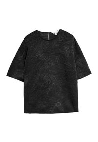 Top nero con maniche corte, caratterizzato da un motivo geometrico testurizzato. Collo rotondo e dettaglio con zip sul retro nascosta.