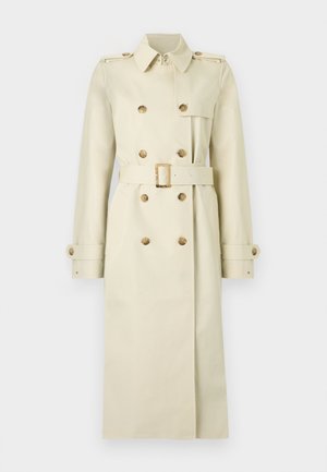 Beige trenchcoat med dobbeltradet design, gullfargede knapper, belte i midjen, skulderklaffer og lange ermer. Jevn stofftekstur.