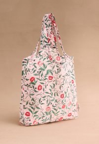Újrahasználható vászonszatyor könnyű anyagból. Virágmintával, piros ajkakkal, zöld levelekkel és rózsaszín háttérrel. Hosszú, puha fogantyúk.