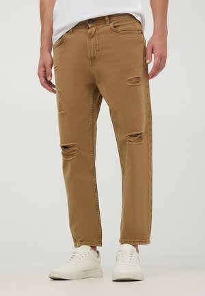Jeans Tapered Fit - beige