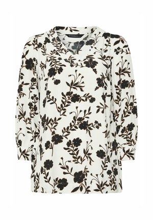 Witte blouse met een zwart bloemenpatroon, korte mouwen en een V-hals. Lichtgewicht stof met een elegante val.