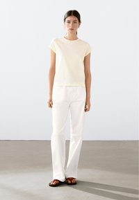 Massimo Dutti SHORT SLEEVE WITH ROUND NECK - T-shirts basic - yellow