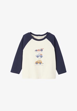 Long-sleeve cotton T-shirt with cream body and navy raglan sleeves, featuring cartoon cars and text in blue and orange.