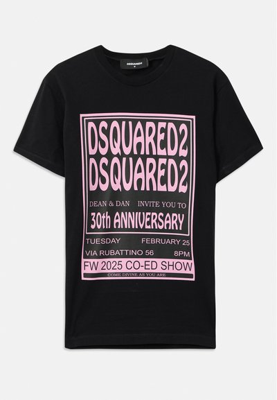 Black cotton t-shirt featuring large pink graphic text. Design includes event details in varying font sizes and additional information at the bottom.