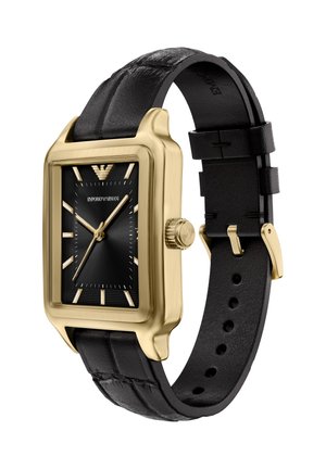 Gold-toned rectangular watch with a black textured dial, gold hour markers, and a black leather strap featuring stitching and a metal clasp.