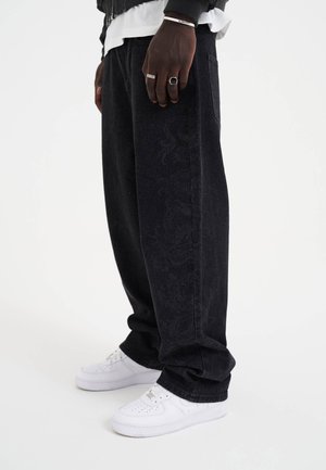 LASER ETCHED DRAGON REPEAT  - Relaxed fit jeans - black