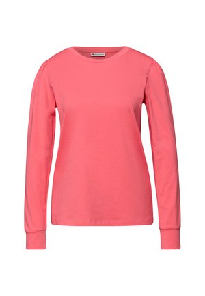 Long-sleeve coral t-shirt made from soft cotton. Features a crew neckline, ribbed cuffs, and subtle gathered detail at shoulders.
