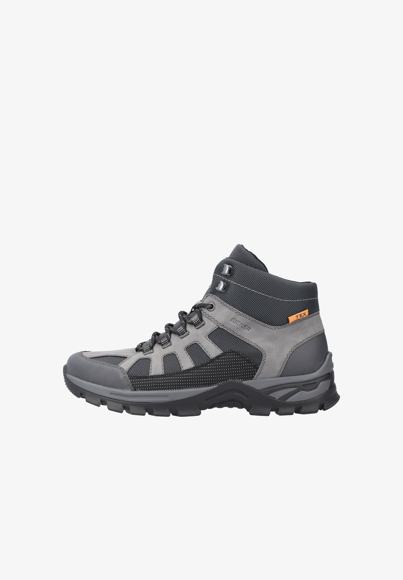 Grau wanderschuhe mit einem hohen Design. Verfügt über eine Kombination aus Mesh- und Leder-Materialien, Gummisohle und einem mittleren Schnürsystem.