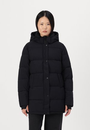 Black puffer jacket featuring a hood, secured with buttons, and a quilted texture. It has long sleeves and a relaxed fit.