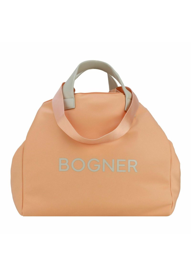 Torebka typu tote w kolorze brzoskwiniowym o gładkiej fakturze, z szarymi uchwytami i wyraźnie widocznym logo "BOGNER" na przedniej stronie.