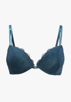 Teal lace bra with a plunging neckline, padded cups, and adjustable straps. Features floral lace pattern and a metal front closure.