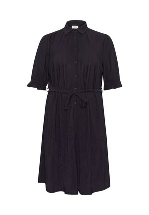 Melna, īsām piedurknēm krekla kleita no teksturēta auduma ar pogu aizdari un saites vidukļa detalizāciju. Rips ir virs ceļgaliem.