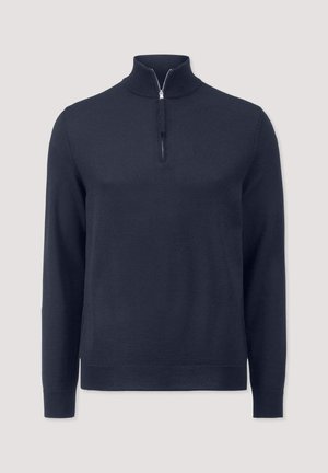 Marineblauwe gebreide trui met een halflange rits, lange mouwen en geribde manchetten en onderkant. Gemaakt van zachte stof, met een gladde textuur.