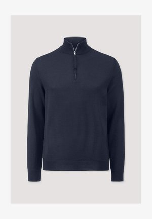 Marineblauwe gebreide trui met een halflange rits, lange mouwen en geribde manchetten en onderkant. Gemaakt van zachte stof, met een gladde textuur.
