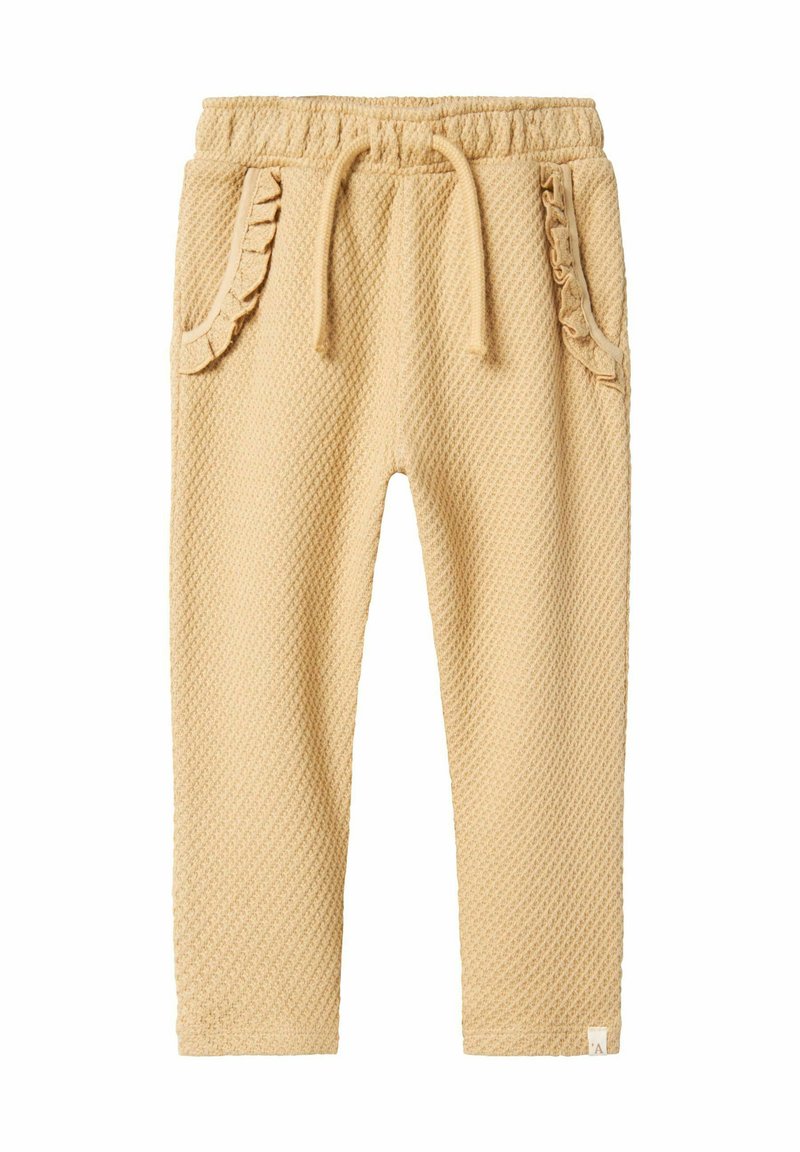 Jogging en mélange de coton dans une teinte jaune clair avec texture gaufrée, poches froncées, taille élastique et cordon de serrage.