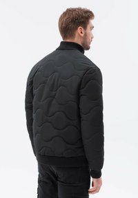 Ombre Vinterjakker - black