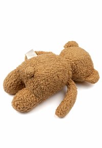 Brauner Teddybär aus strukturiertem Stoff. Runde Glieder und Kopf, mit einem kleinen Schwanz. Auf dem Rücken befindet sich ein Kleidungsetikett.