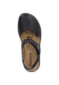 Sandal in pelle nera con punta chiusa, cinturino regolabile e soletta imbottita con motivo a foglia, progettato per il comfort.