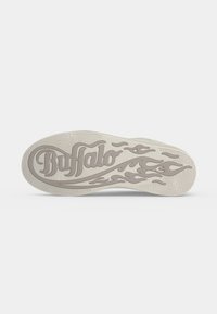 Shoe sole with embossed "Buffalo" text and flame design in light beige, textured for grip, photographed from the bottom.