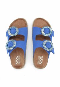 Sandali blu con due accenti rotondi a righe. Materiale in suede morbido, design open-toe e suole interne imbottite marrone chiaro. Cinghie minimaliste e regolabili.