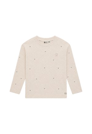 Camicia beige a maniche lunghe per bambini con piccoli motivi neri ricamati a forma di V sparsi sul davanti e sulle maniche.