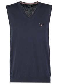 Navyblauer ärmelloser Strickpullover mit V-Ausschnitt, der ein dezentes Strukturmuster und ein kleines GANT-Logo auf der Brust zeigt.