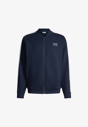 Marineblaue Zip-Up-Jacke mit weißen Seitenstreifen und „JOOP! JEANS“-Logo auf der linken Brust, mit geripptem Kragen und Bündchen.