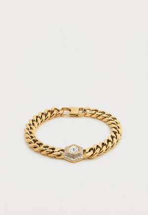Gullkjede armbånd med en sekskantet midtdel som har en klar stein og omkringliggende rhinestones, festet med en hummerlås.