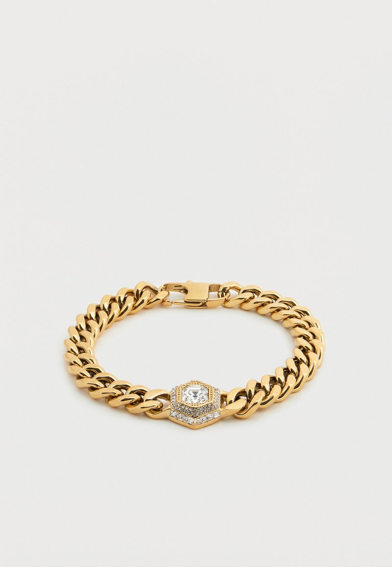 Brățară cu lanț auriu, având o piesă centrală hexagonală cu o piatră transparentă și strasuri înconjurătoare, fixată cu un cârlig tip homar.