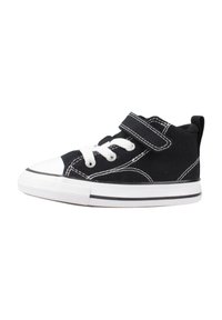 Sneaker nera in tela con punta in gomma bianca, lacci e cinturino in velcro. Presenta cuciture bianche e una striscia nera sulla suola.