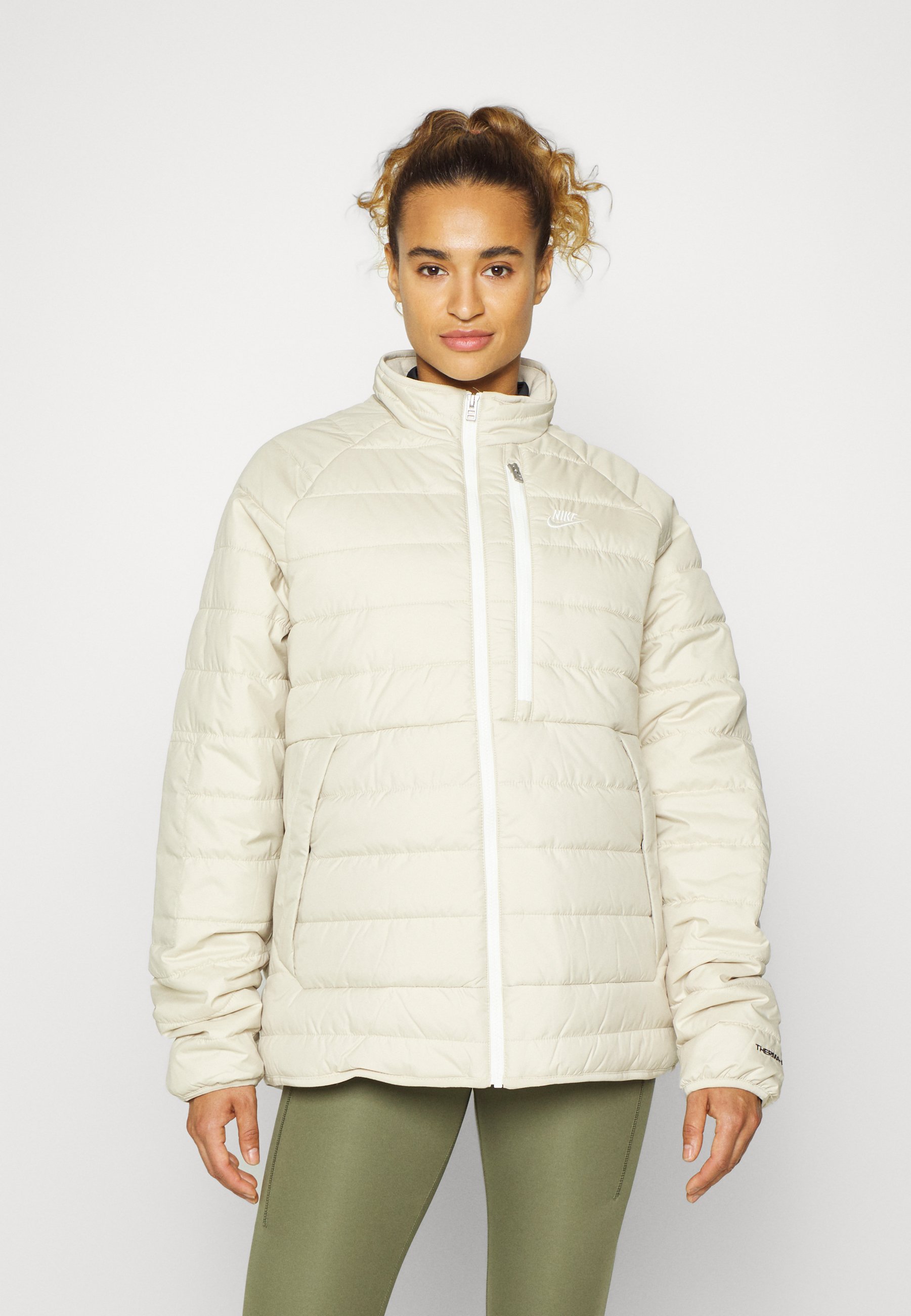 nike puffer beige