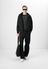 Calvin Klein Vodotesná bunda - black