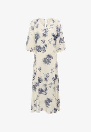 Duža cvjetna haljina od lagane bež tkanine s plavim cvjetnim uzorcima, V izrezom i napučenim rukavima.