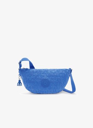 Blue fabric bag with a curved shape, textured surface featuring a leaf pattern, adjustable strap, and a small charm with a monkey design.