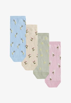 Quatre chaussettes aux couleurs pastel en bleu, beige, vert et rose, chacune ornée de petits motifs floraux dispersés sur le tissu.