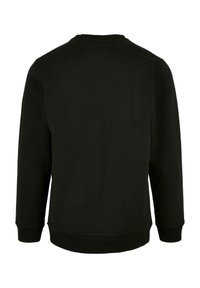 Black cotton sweatshirt with a crew neck, long sleeves, ribbed cuffs, and a ribbed hem, featuring a smooth, non-textured surface.
