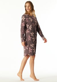 Long-sleeve nightdress in dark grey with pink floral pattern. Features a rounded neckline and scalloped hem. Made from soft, breathable fabric.