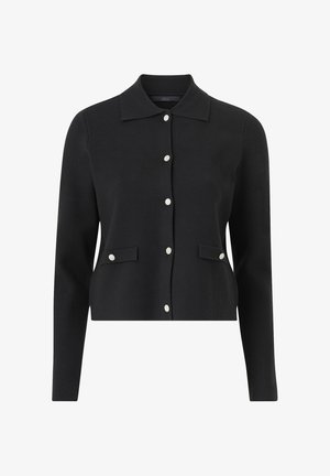 Schwarzer gestrickter Cardigan mit einem Kragen, langen Ärmeln und sechs dekorativen Knöpfen. Hat zwei vordere Taschen.