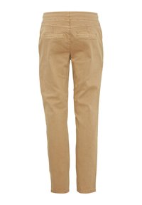 Pantalones de algodón beige con un corte ajustado, que presentan dos bolsillos traseros y una textura suave. La cintura es blanda y está diseñada para mayor comodidad.