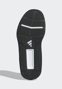 Semelle extérieure en caoutchouc noir avec un motif texturé et des accents blancs. Comprend une semelle intercalaire rectangulaire avec le texte en relief "REPETITOR."