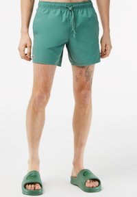 Lacoste Uimashortsit - vert kaki   vert