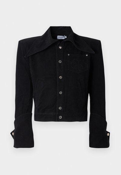 Black cropped jacket made of soft fabric featuring a large collar, front pockets, decorative stitching, and metallic button closures.