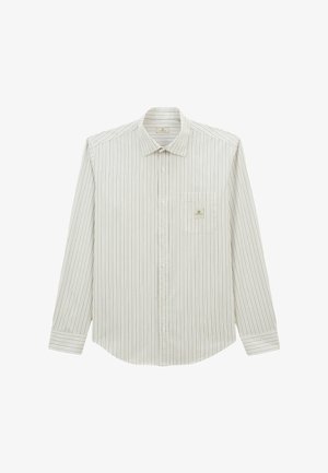 Chemise à rayures de couleur claire à manches longues, fabriquée dans un tissu à la texture lisse. Elle possède un col avec boutons et une poche poitrine avec une étiquette.