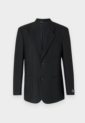 Black blazer made from smooth fabric, featuring a notched lapel, two front pockets, two buttons, and a subtle logo on the sleeve.