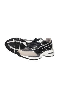 Black and silver athletic shoes featuring a textured upper, lace-up design, padded collar, and a white and black patterned outsole.