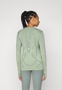 ASICS ROAD SEAMLESS TOP - Longsleeve - lichen rock/monument blue