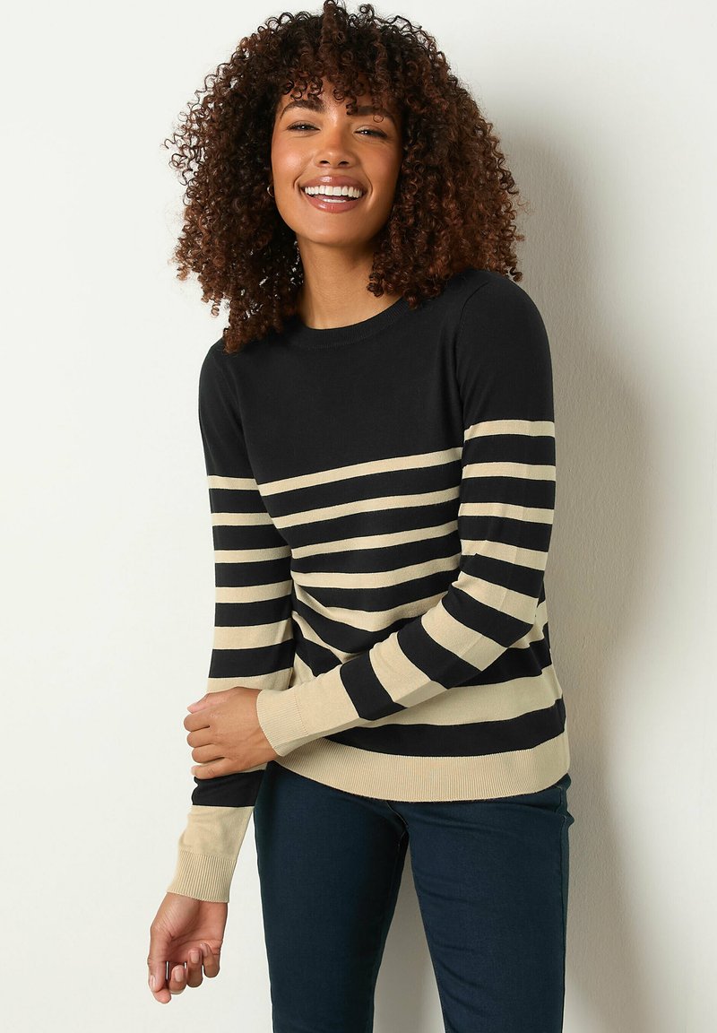 Gestreifter Pullover in Schwarz und Beige, Rundhalsausschnitt, lange Ärmel und gerippte Bündchen. Weiches Material mit einer figurschmeichelnden Silhouette.