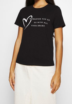 Black cotton t-shirt with short sleeves, featuring white text and a heart graphic: “WHEREVER YOU GO GO WITH ALL YOUR HEART.”
