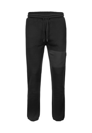 Czarne spodnie dresowe wykonane z miękkiego materiału z elastycznym pasem i regulowanym sznurkiem. Posiadają boczną kieszeń z kontrastowego matowego materiału.