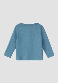 Lange mouwen shirt in lichtblauw, gemaakt van textuurstof. Ronde hals en een eenvoudig, strak ontwerp zonder zichtbare patronen of accenten.